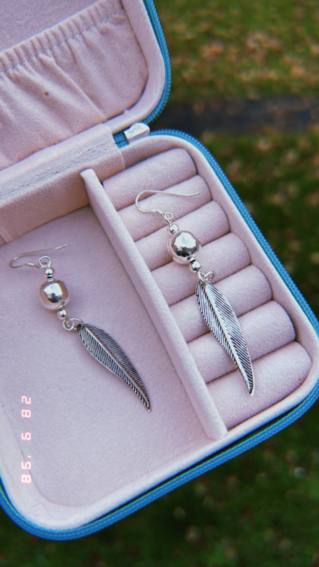 Silver feather earrings